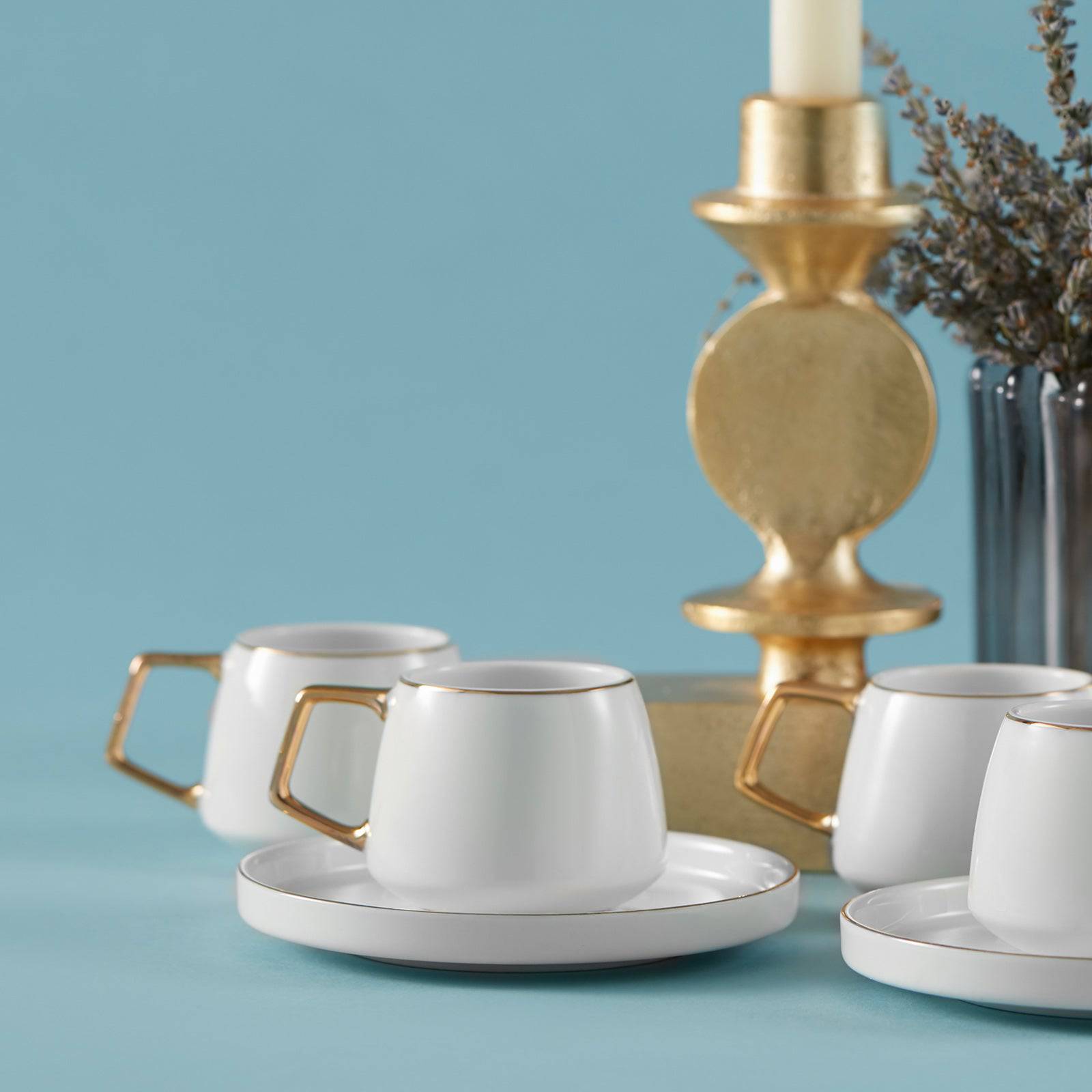 Six-piece Saturn porcelain coffee cup set by KARACA and KARACA HOME, featuring elegant white cups with matching saucers.