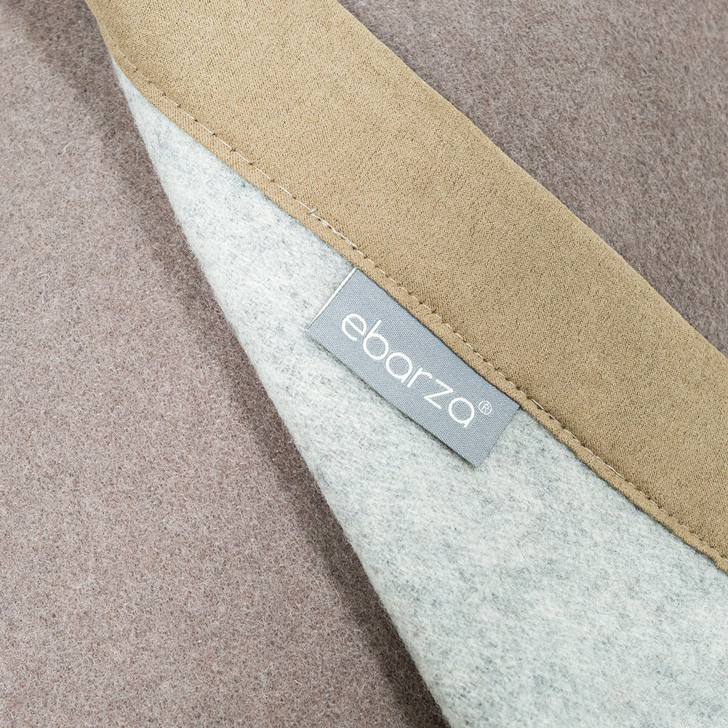 BEACON Lento Wool Blanket DR-B020 displayed as a cozy scarf in beige with soft texture and fringed edges.