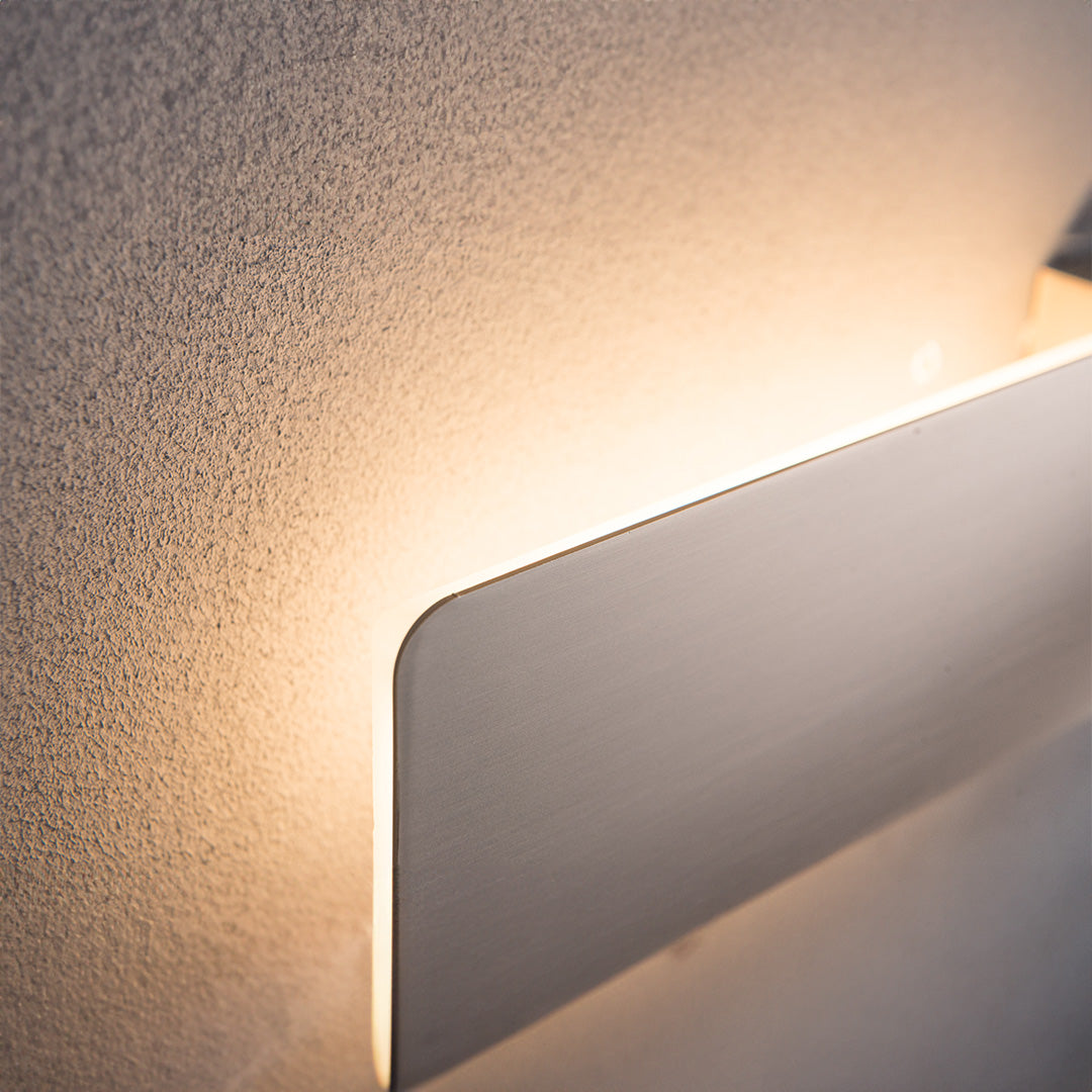 Seed Hotel Style Wall Reading Lamp by BEACON, featuring a sleek headboard design and adjustable lighting for cozy bedroom ambiance.