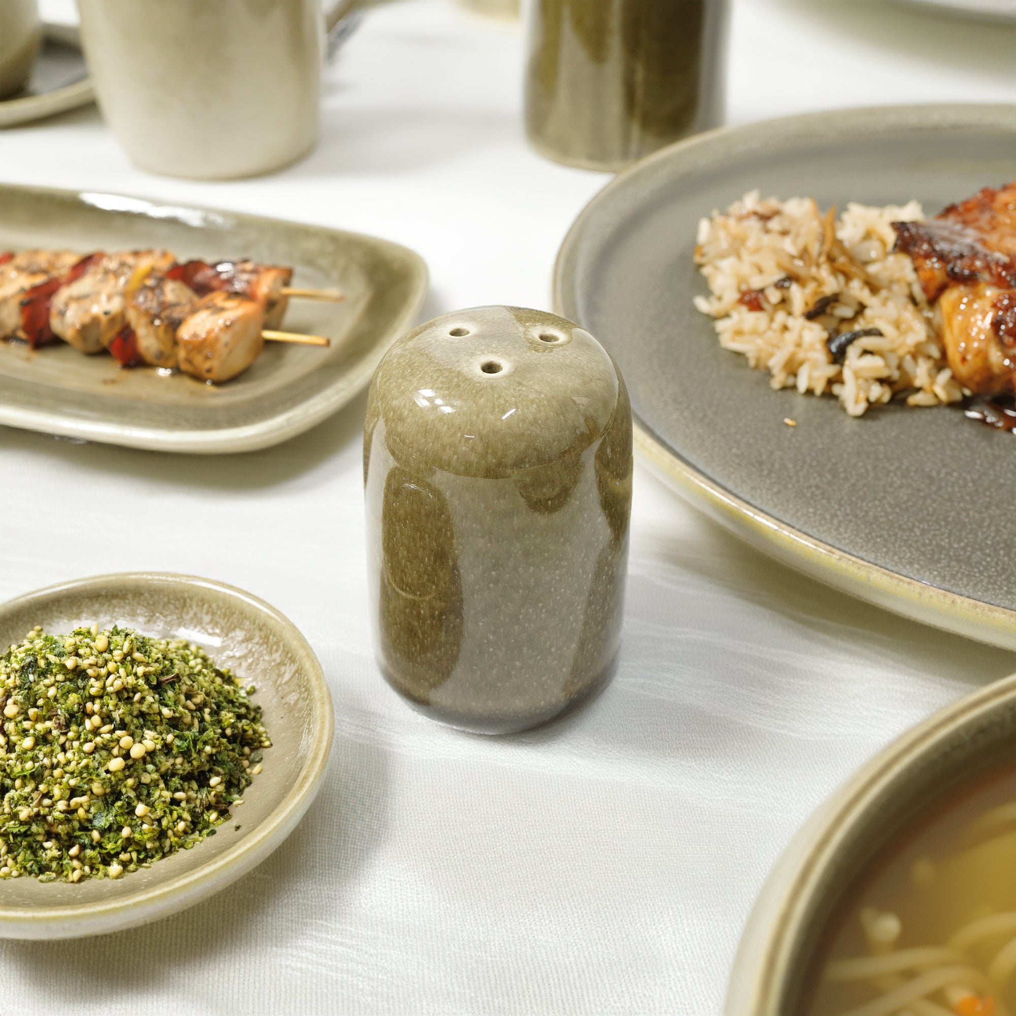 Set of 2 BEACON Browny Salt & Pepper spice sets in dark grey, featuring shakers with clear labels and matching caps.