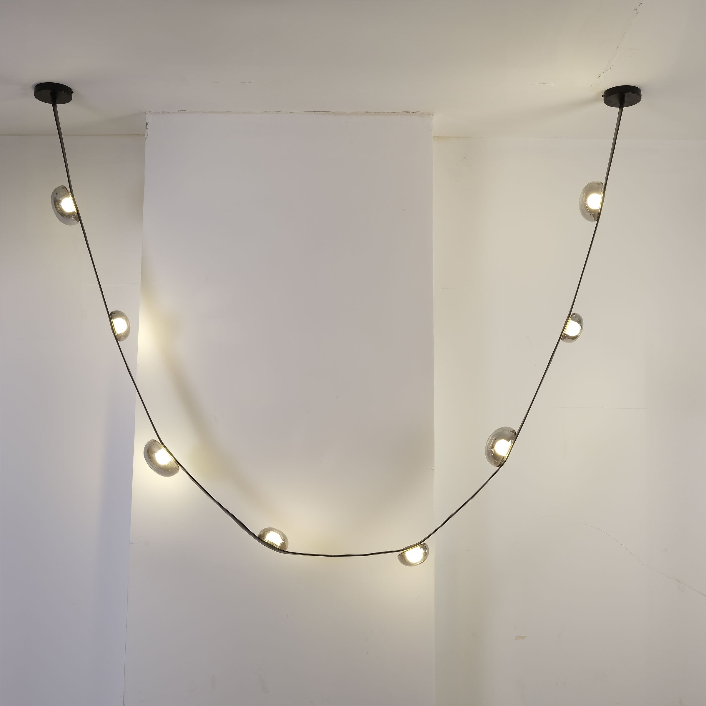 Set of 3 BEACON Whispering Stars pendant lamps in different sizes, featuring star-shaped designs for modern interior lighting.