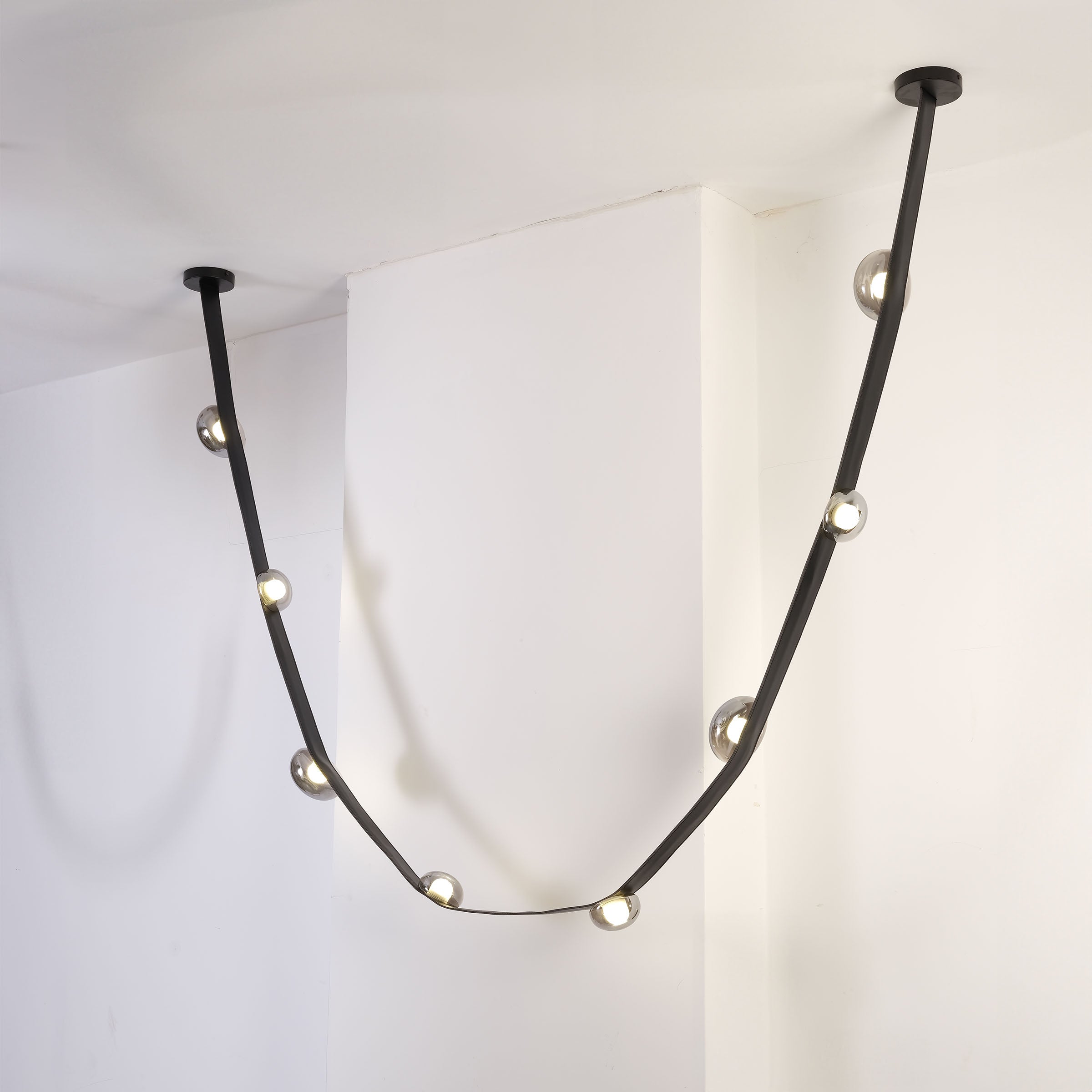 Set of 3 Whispering Stars pendant lamps by BEACON, featuring elegant star-shaped designs in varying sizes for modern decor.