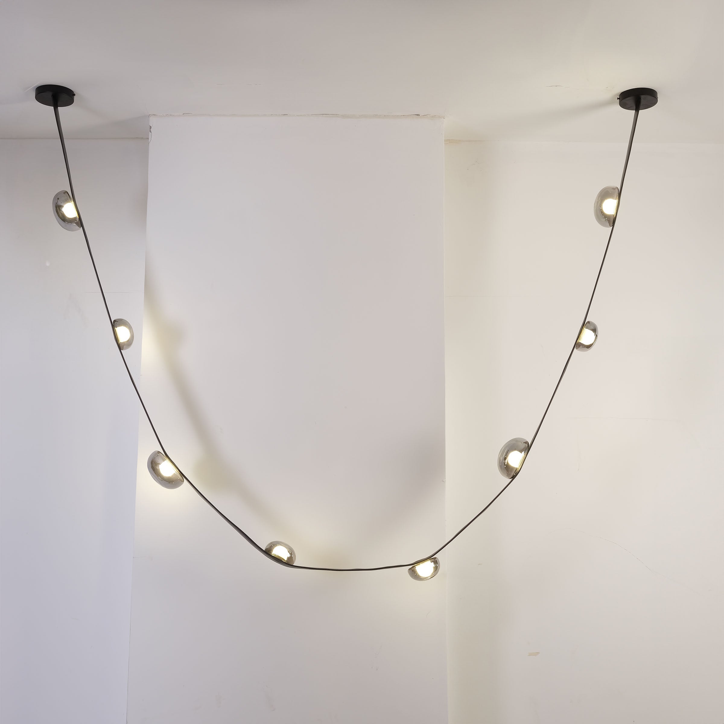 Set of 3 BEACON Whispering Stars pendant lamps in varying sizes, modern design with star-shaped shades for stylish lighting.
