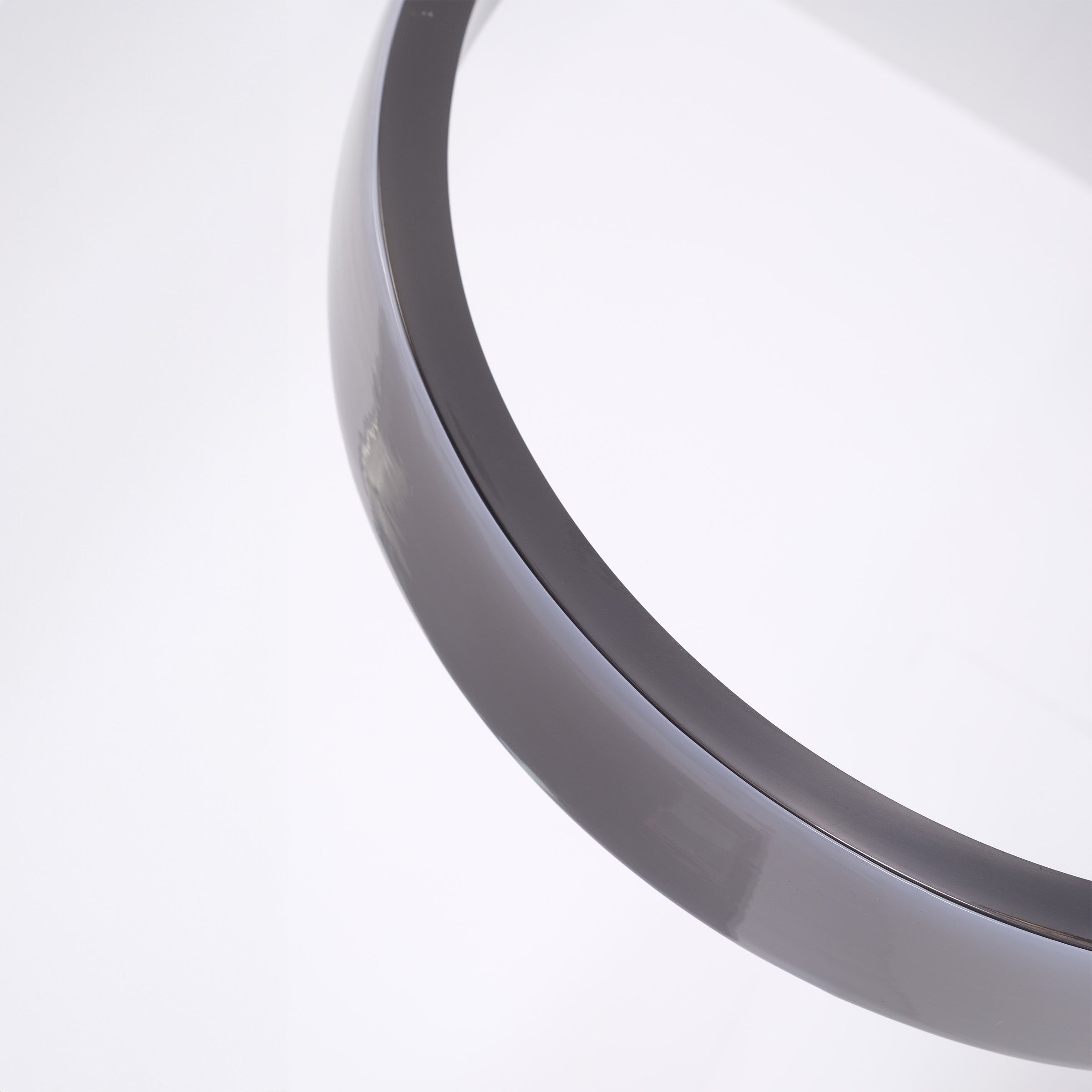 Set of three BEACON leather curve pendant lamps with sleek, modern design and curved leather detailing.
