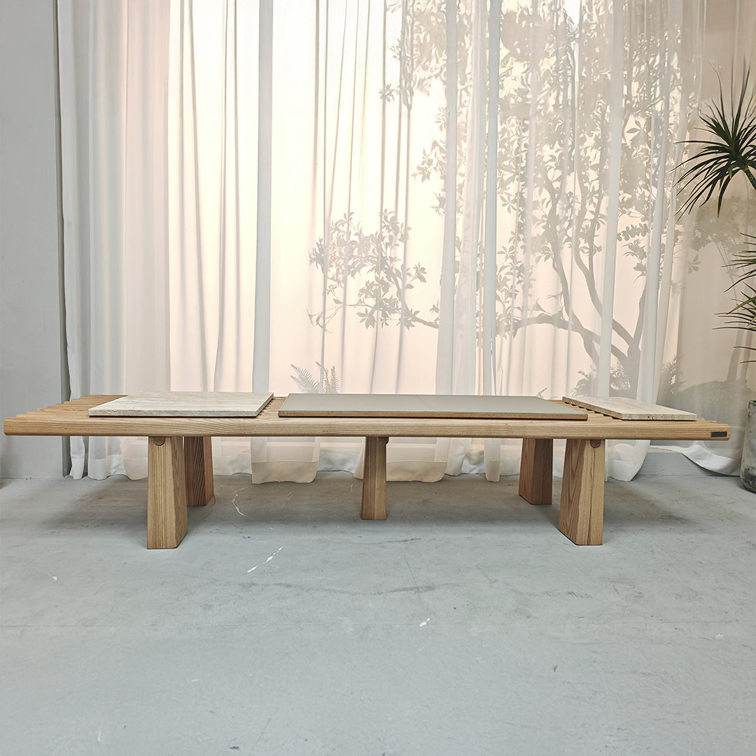 Severus Ashwood Bench by BEACON featuring a sleek, modern design with smooth wooden finish and sturdy legs for seating.