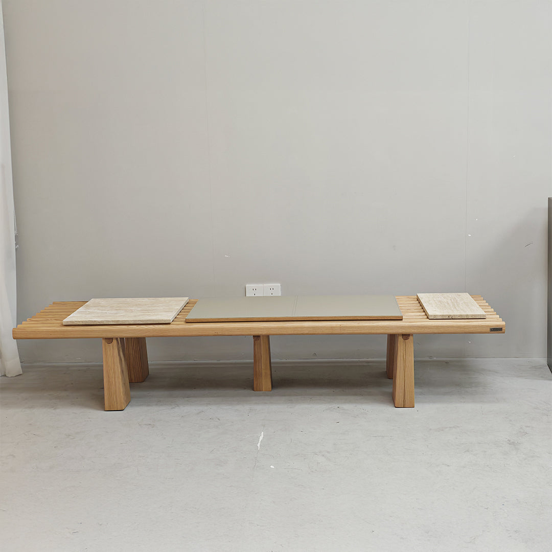 Severus Ashwood Bench by BEACON, featuring a sleek wooden design with a smooth surface and sturdy legs for seating.
