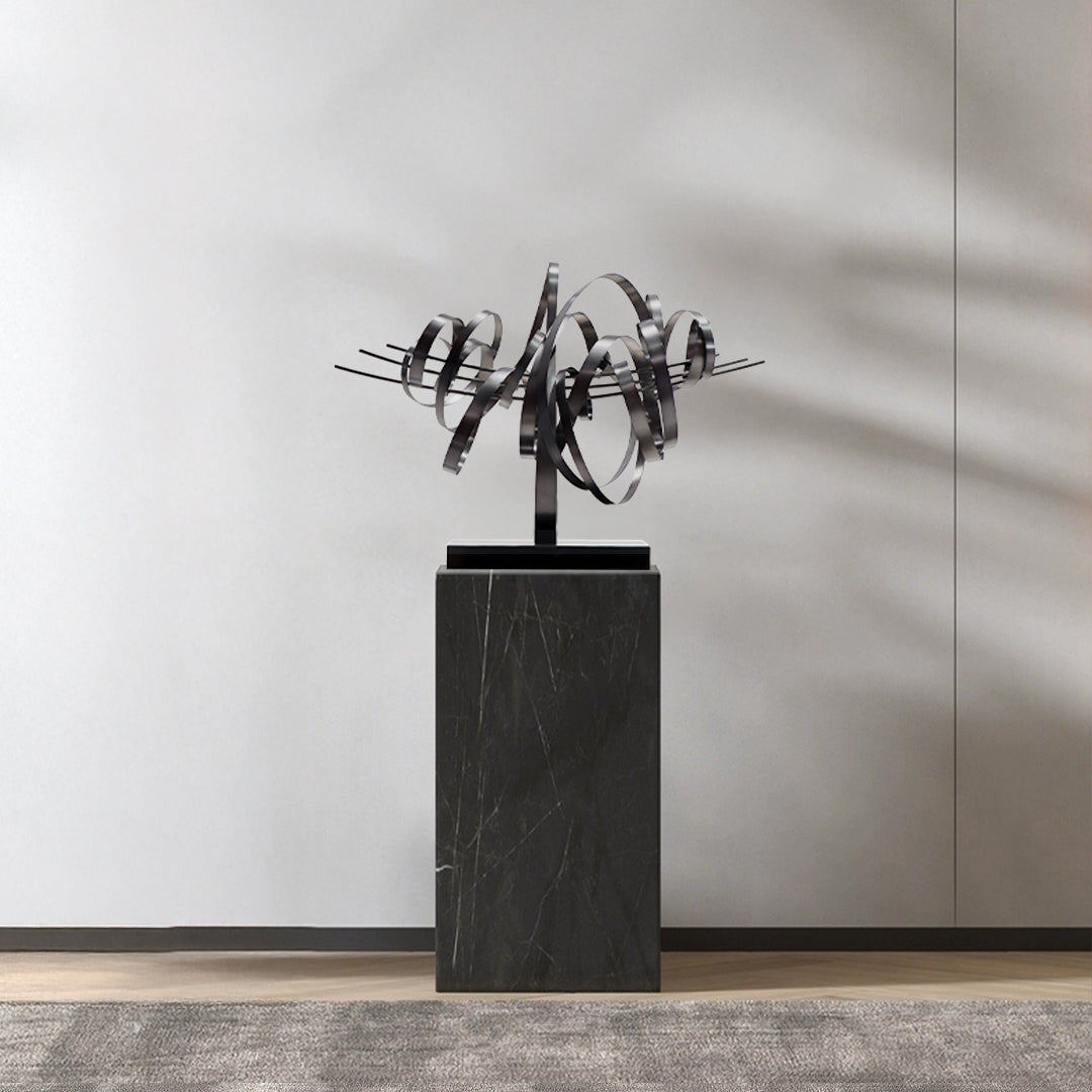 Handcrafted stainless steel artwork titled Shock Wave by BEACON, showcasing intricate design and metallic finish.