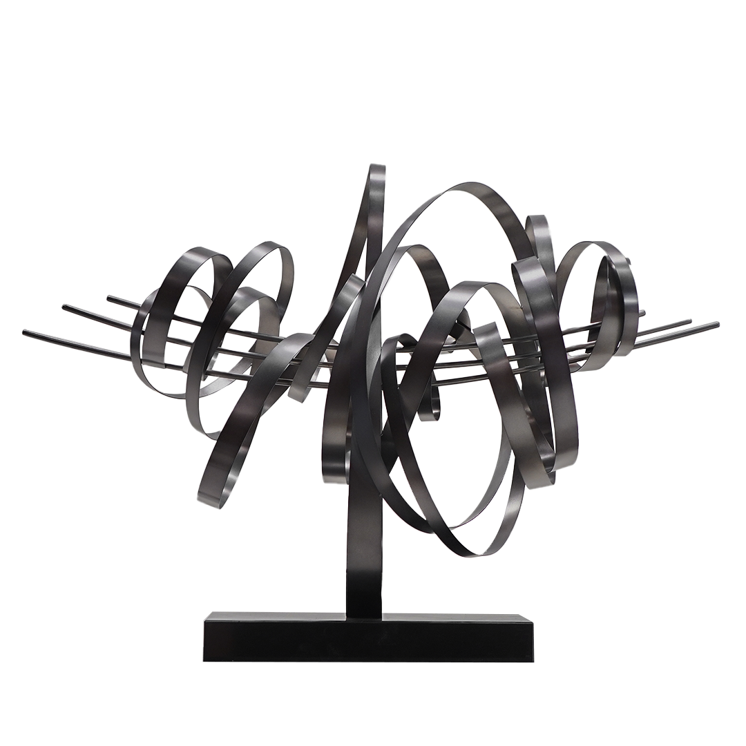 Handcrafted stainless steel Shock Wave artwork by BEACON, showcasing smooth, flowing metal sculpture with intricate details.