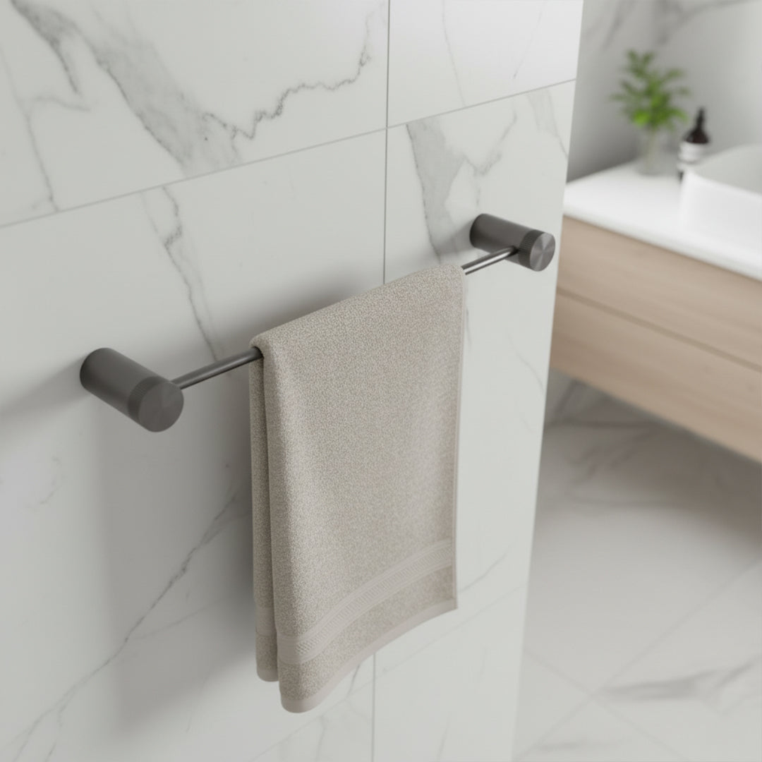 Brass single towel bar from BEACON bathroom accessories, sleek wall-mounted towel holder in a modern bathroom setting