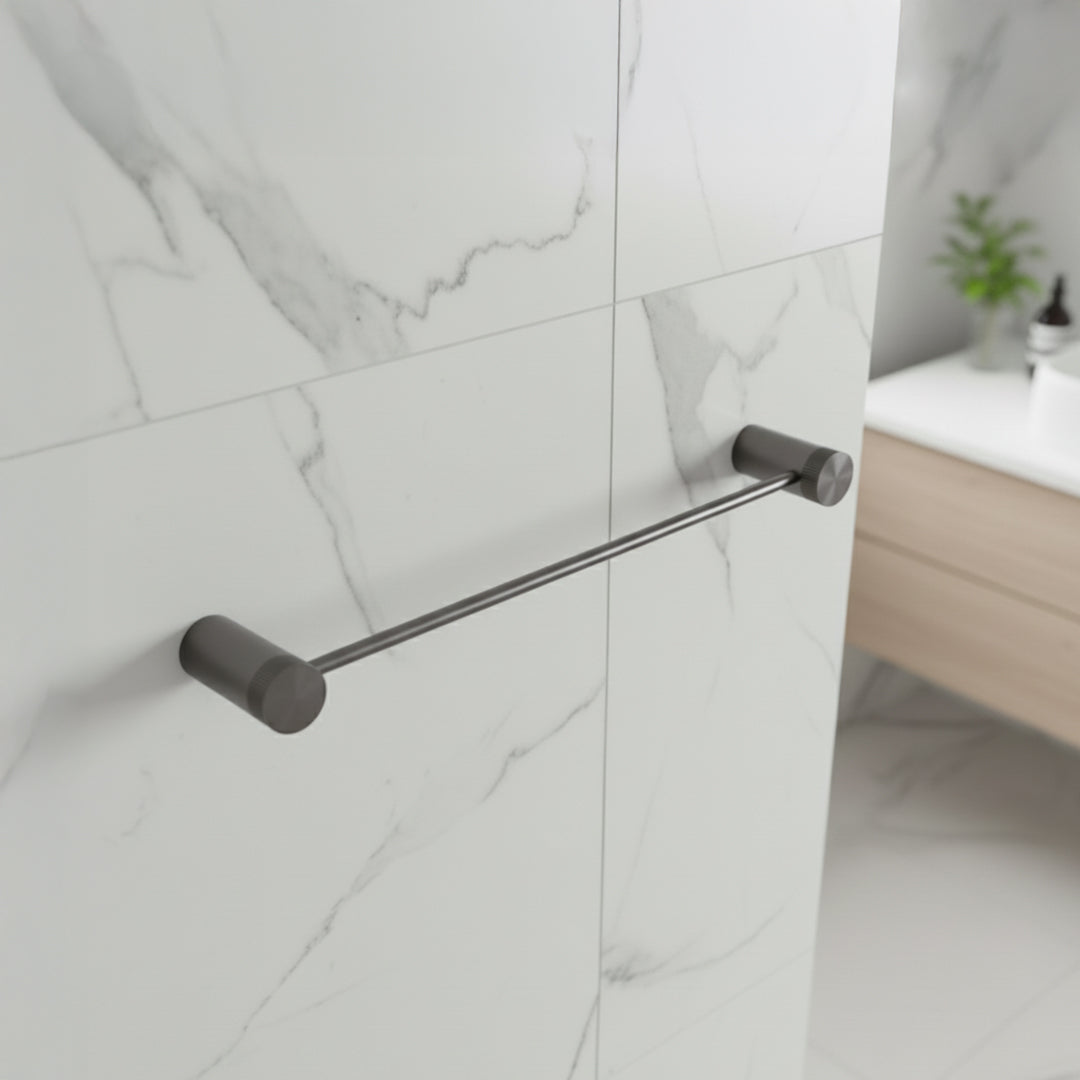 Brass single towel bar from BEACON bathroom accessories, sleek and modern design for holding towels in a bathroom.