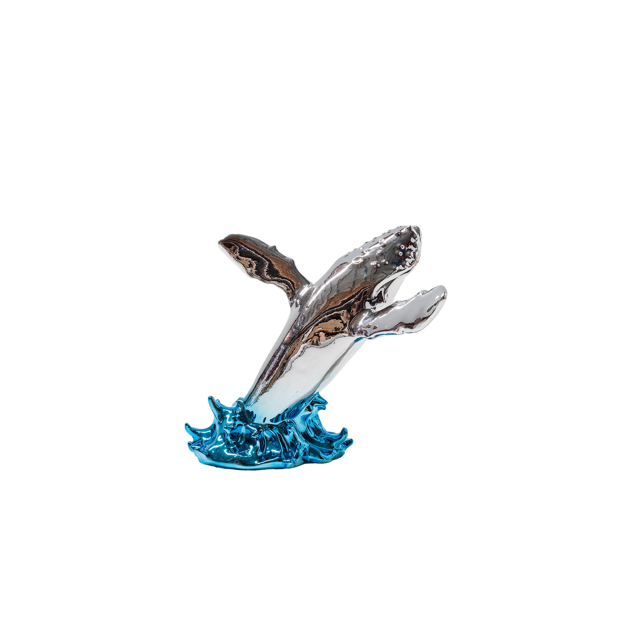 Small fiberglass whale sculpture by BEACON, showcasing a sleek, artistic whale design with smooth curves and a modern finish.