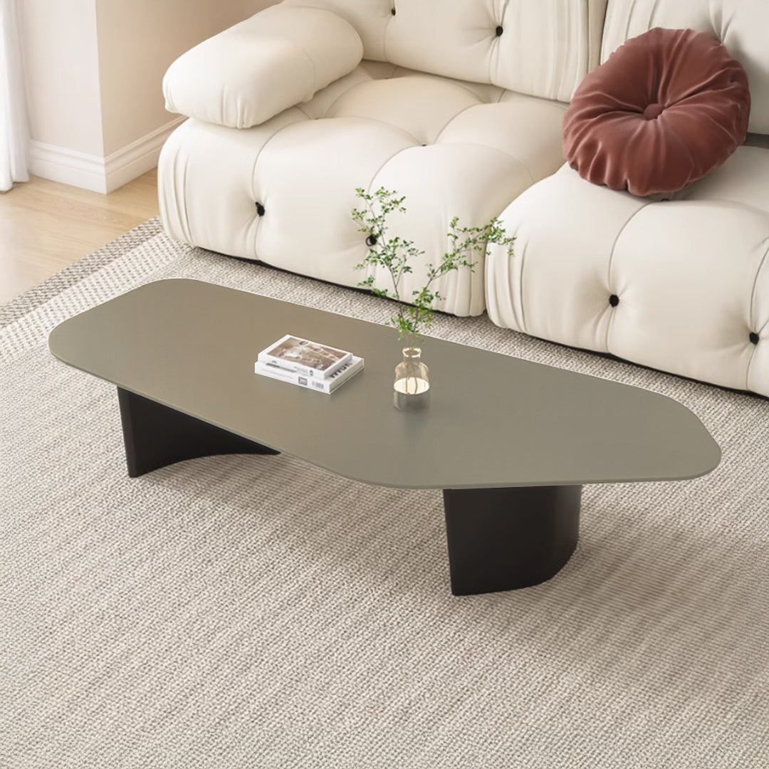 Smoky saddle leather BEACON coffee table with sleek wooden legs, modern design, and smooth leather surface.