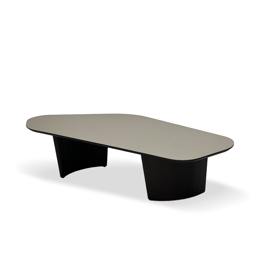 Beige smoky saddle leather coffee table with wooden legs, modern design, and rectangular shape.
