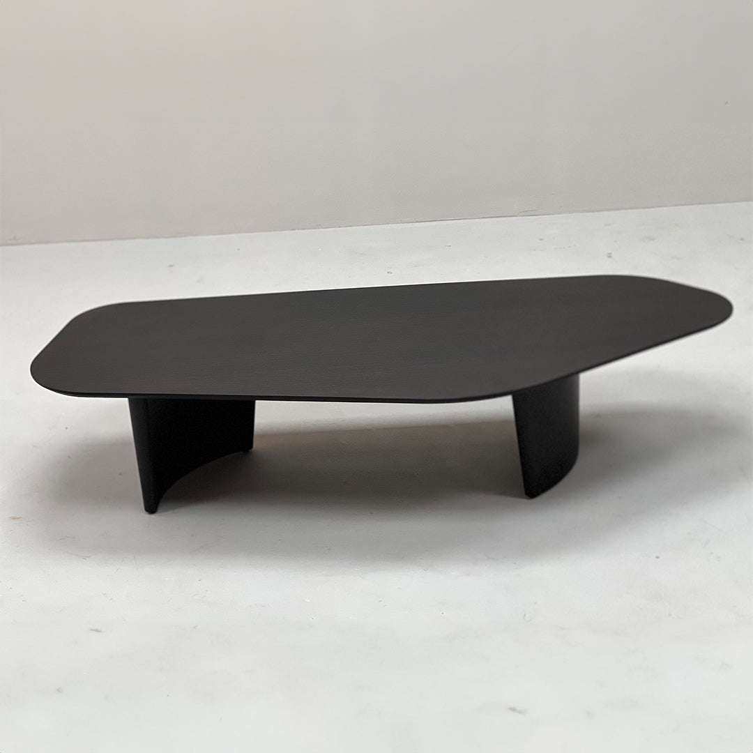 Smoky wood coffee table from BEACON with a modern design, featuring a rectangular top and sturdy wooden legs.