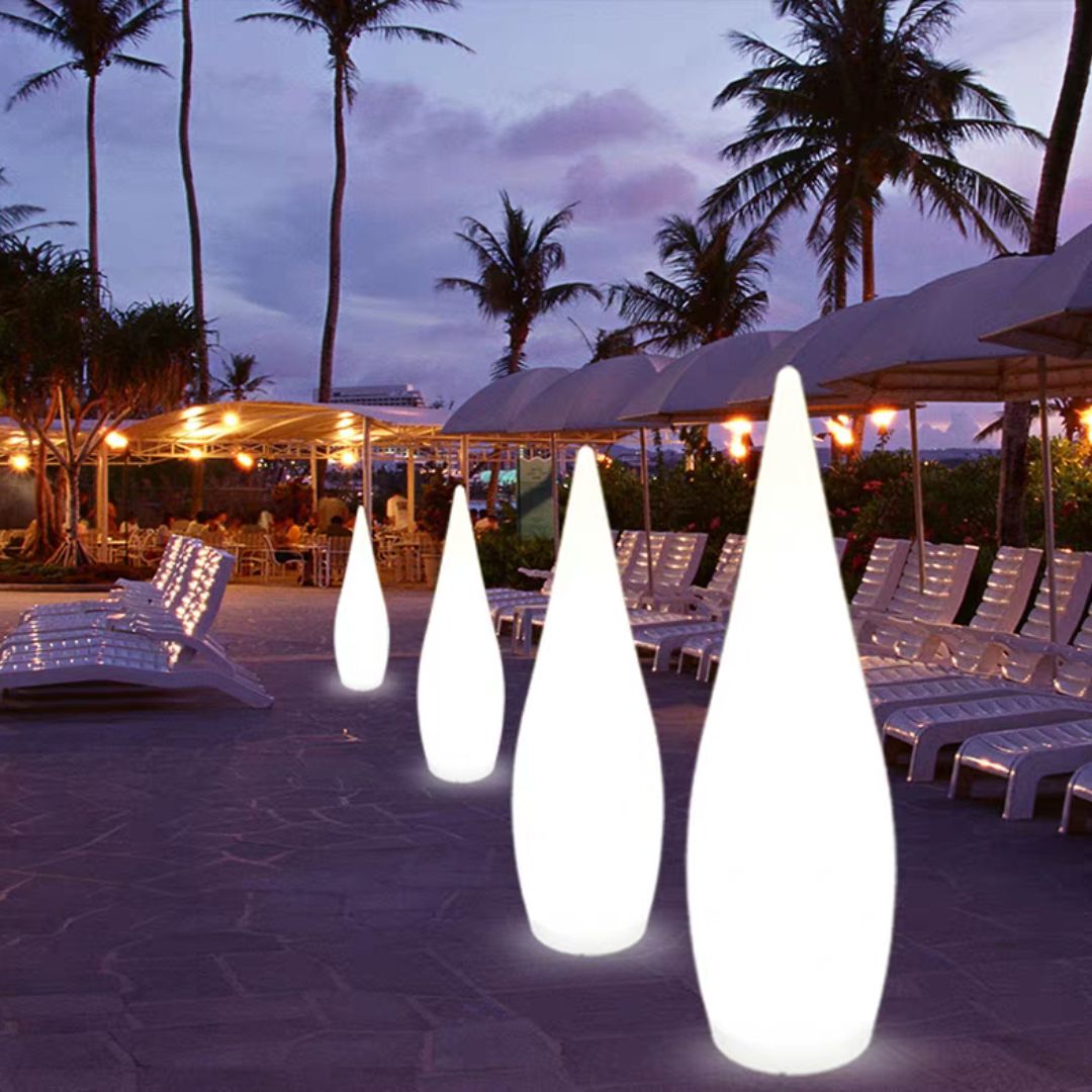 BEACON Soft Drop Resin Floor Lamp HTD-2435 with sleek modern design and soft lighting, standing on a floor.