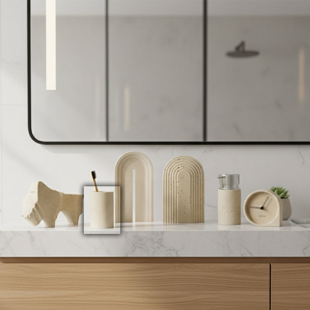 Soft sand round bathroom cup from BEACON, ideal for holding toothbrushes and bathroom essentials in a modern bathroom.
