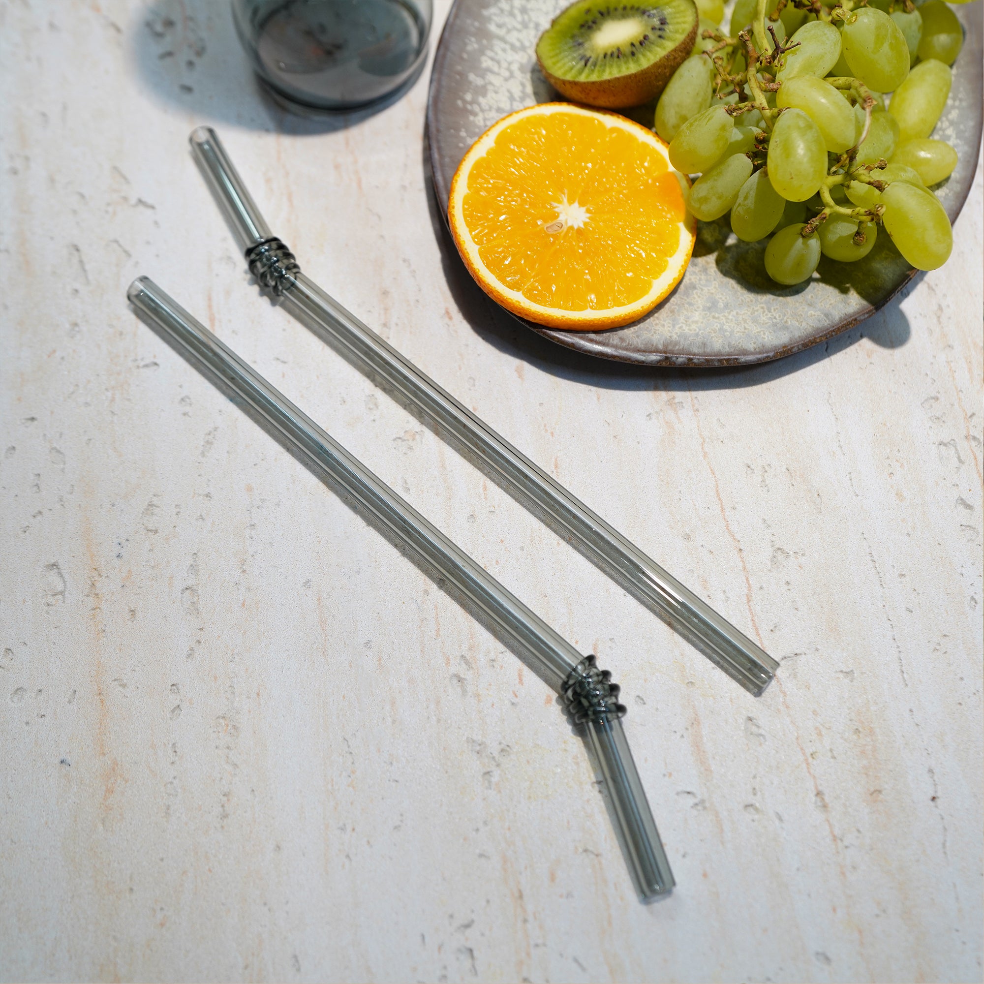 Solid grey straw in BEACON drinkware, model 231173A, designed for use with glasses or cups in a sleek, modern style.