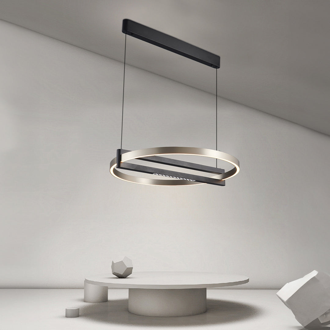 Sparkling geometric pendant lamp by BEACON, featuring a modern design with reflective surfaces and intricate hanging structure.