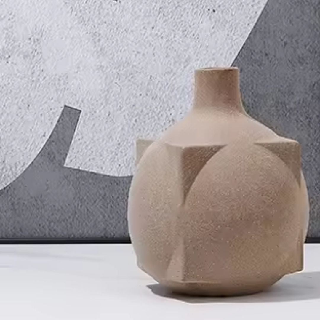 Brown square ball vase by BEACON, made of ceramic, with a modern geometric design, ideal for floral arrangements.