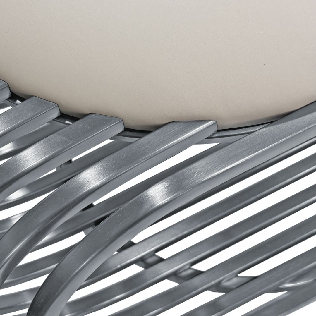 Stainless steel bench cushion measuring 135x40.5cm designed for benches, by BEACON, shown on a stainless steel bench.