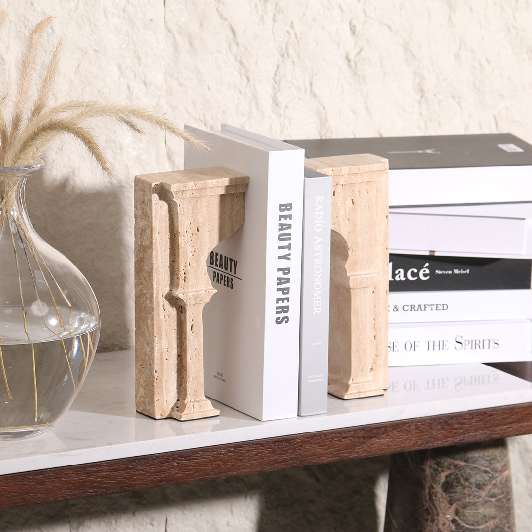 Set of two stone archway bookends by BEACON, featuring realistic stone design, perfect for holding books on a shelf.