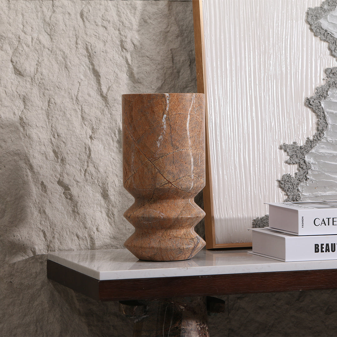 Elegant beige stone vase from BEACON, model KB3017AL, with a smooth, rounded shape perfect for home decor.