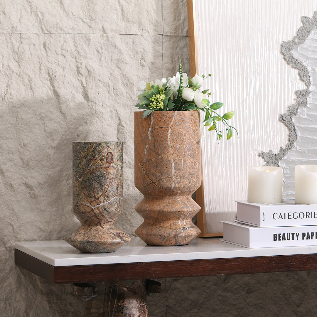 Stone vase by BEACON with a smooth, rounded design, perfect for decorative display or holding flowers.