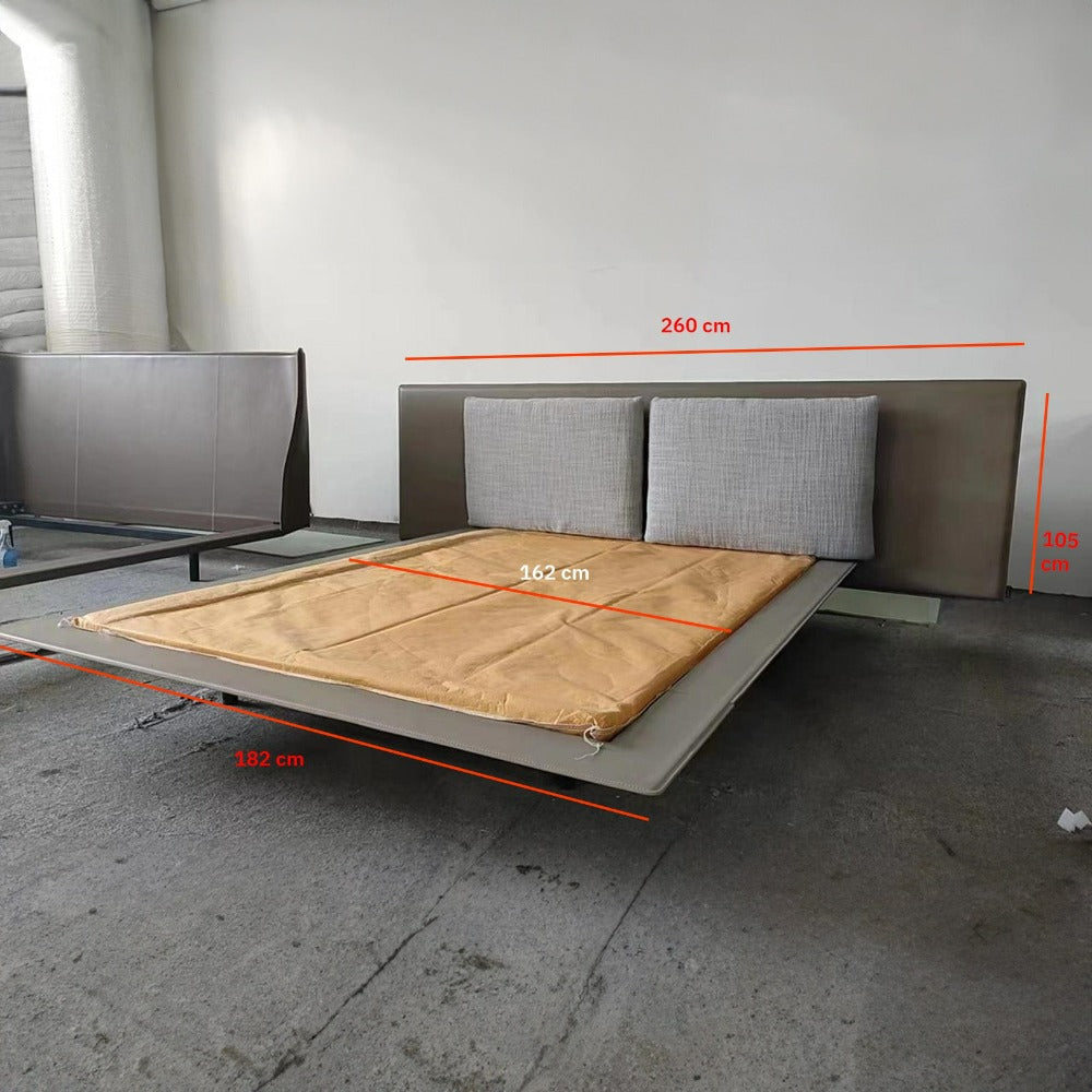 Suspended queen size bedstead by BEACON featuring a modern design with a sleek frame and suspended structure.