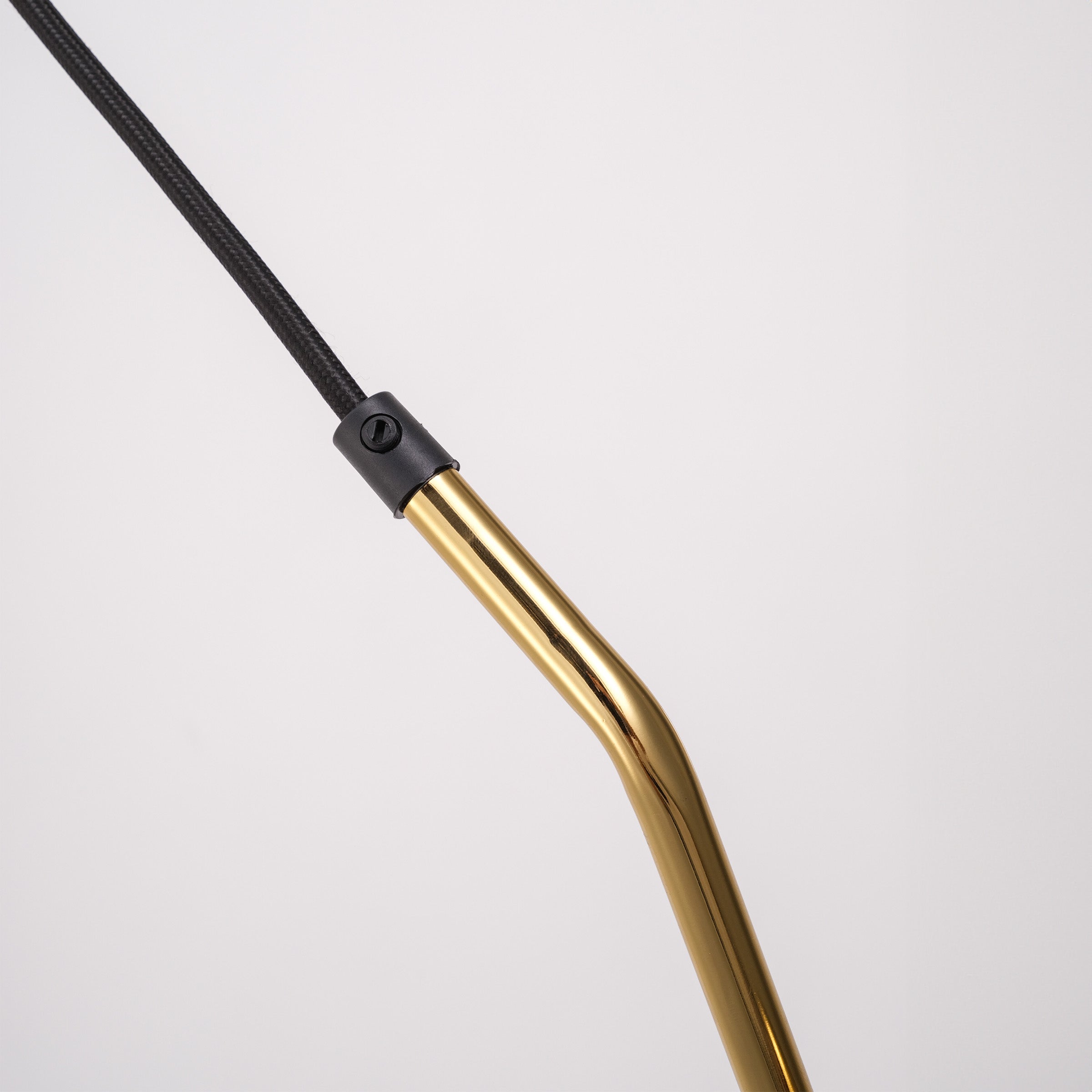 Gold teardrop pendant lamp by BEACON, hanging design with smooth, shiny finish, perfect for modern interior lighting.
