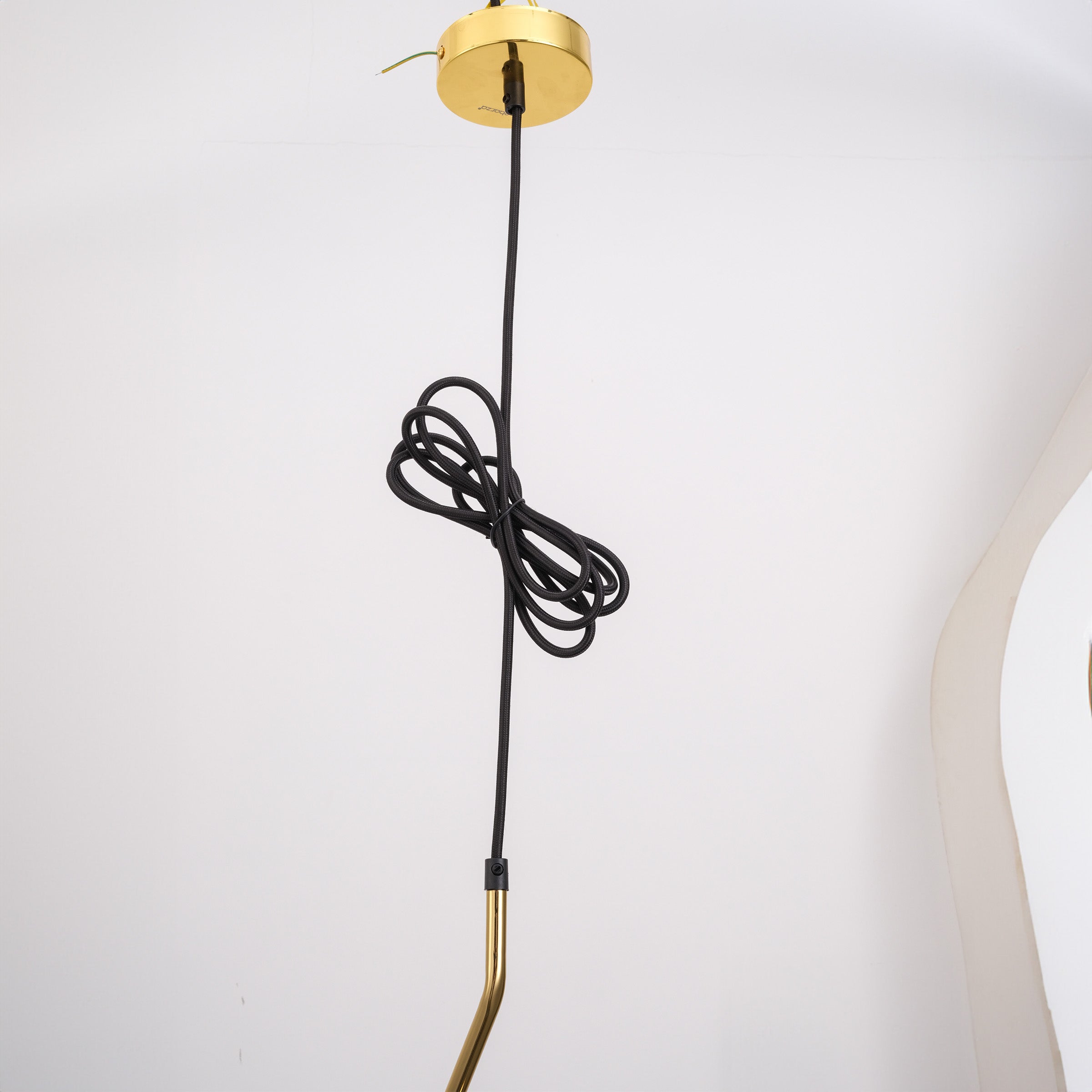 Gold teardrop pendant lamp by BEACON, featuring a sleek, hanging design perfect for modern interior lighting.