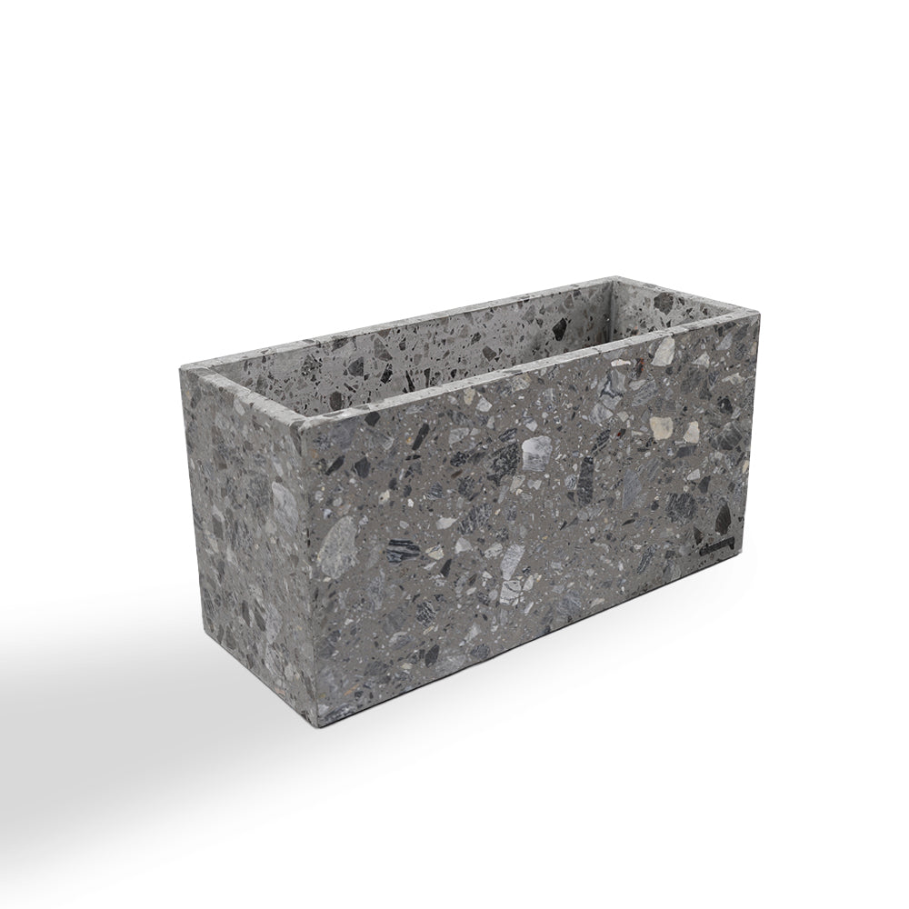Gray terrazzo planter box by BEACON, modern rectangular design, perfect for indoor or outdoor plant displays.