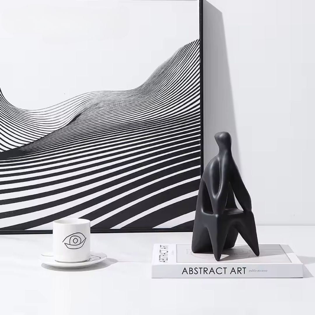BEACON The Thinker ornament, a home decor figurine capturing a contemplative pose, made of detailed sculpted material.