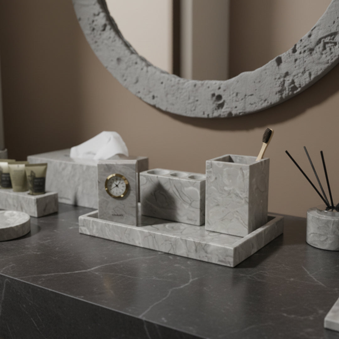 Three-hole toothbrush holder from BEACON bathroom accessories, mounted on a bathroom wall with three slots for toothbrushes.