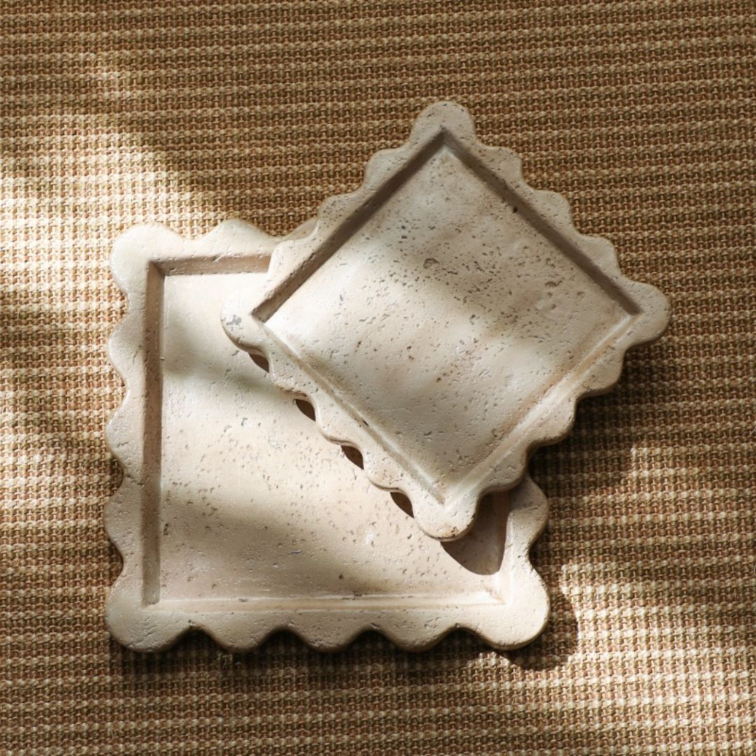 Travertine curved edge tray from BEACON, stylish and durable serving tray with smooth, curved edges for elegant presentation.