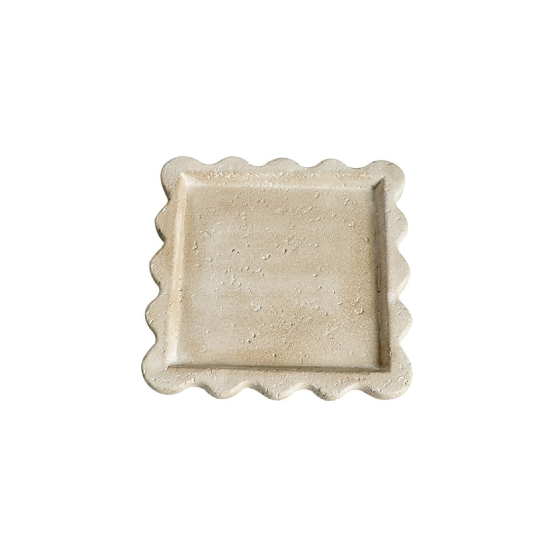 Travel-travertine curved edge plate tray by BEACON, ideal for serving or display, with elegant natural stone finish.