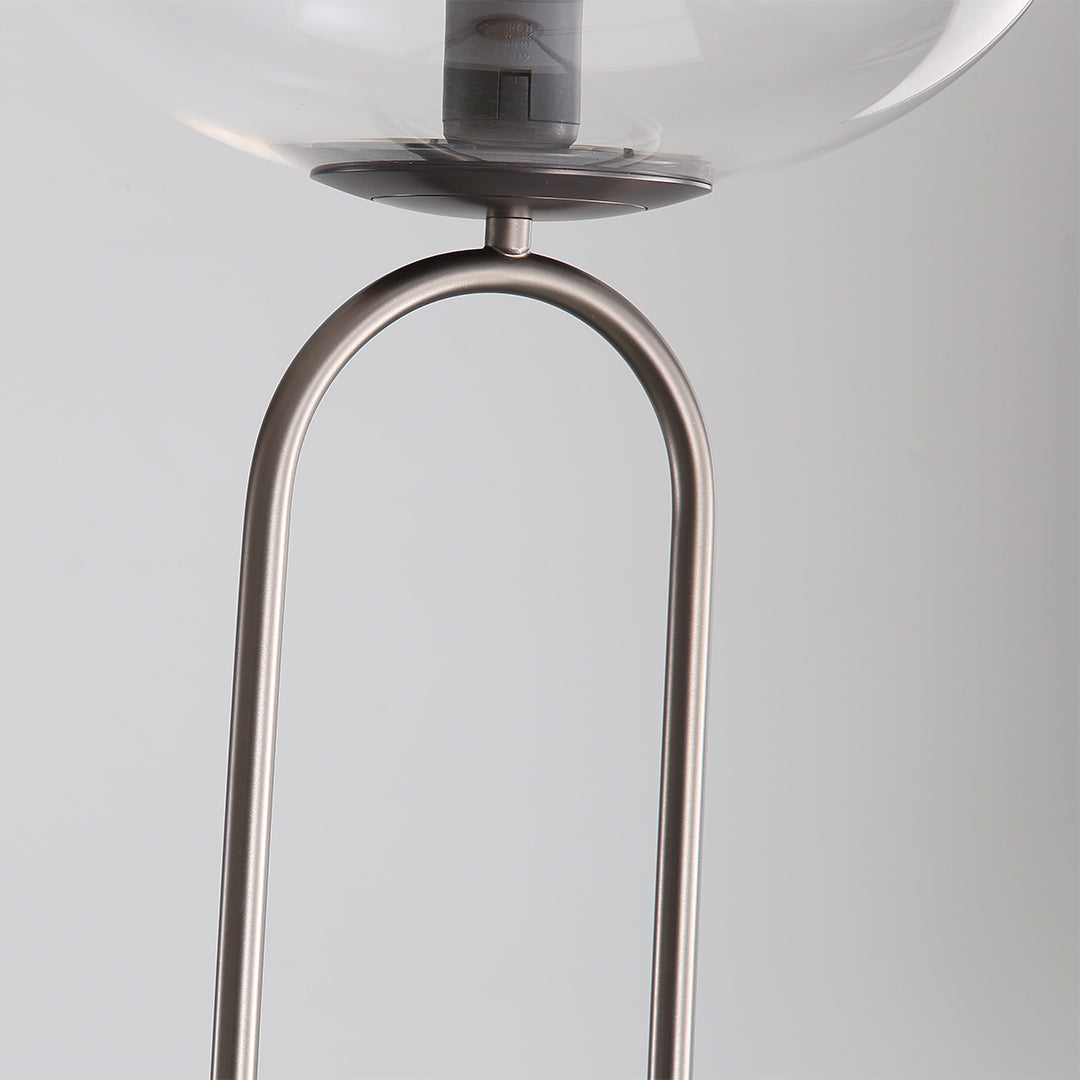 Beige travertine floor lamp with modern design, standing tall with a sleek base, ideal for contemporary living spaces.