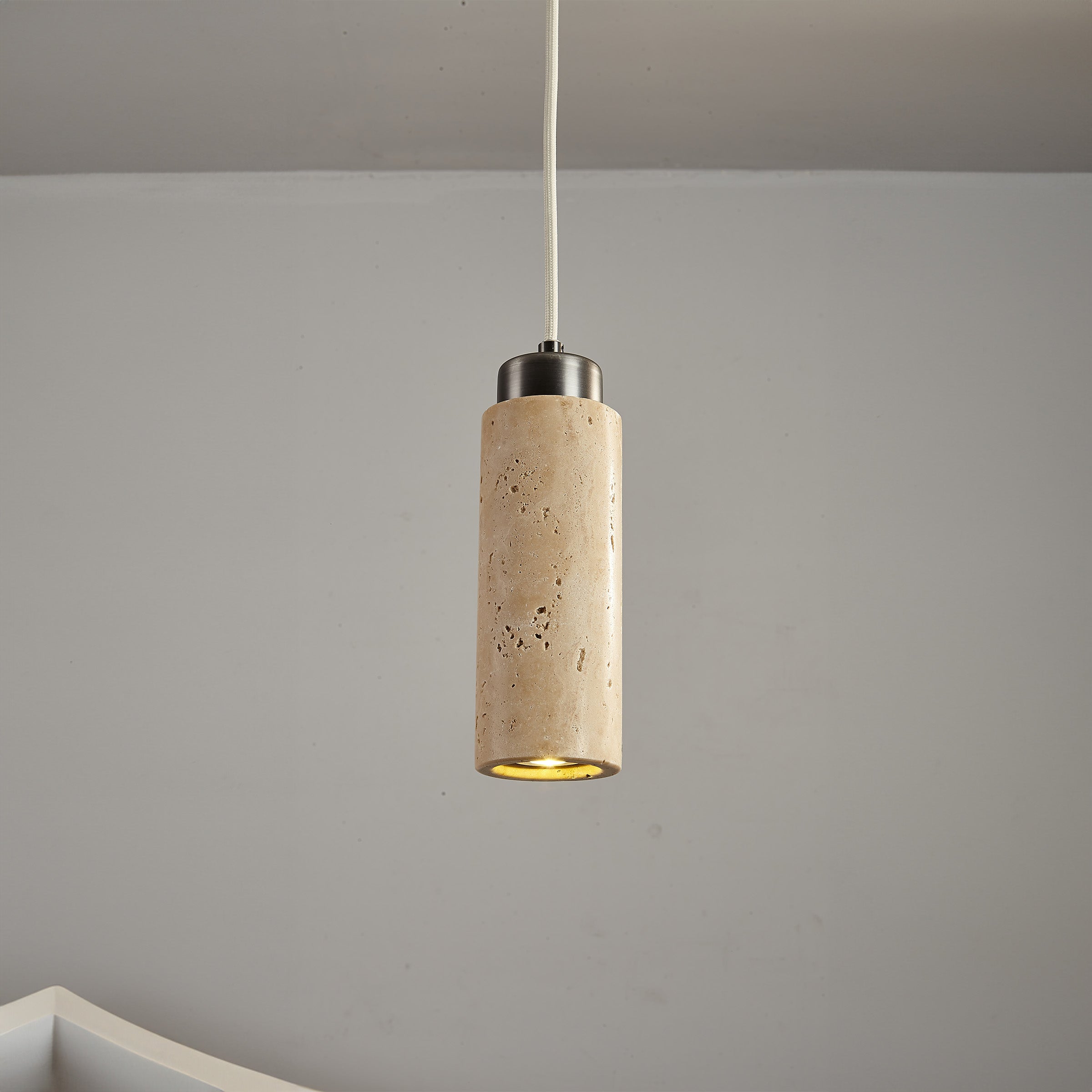 BEACON JIADG travertine pendant lamp 60005-1P with elegant stone-textured shade hanging from ceiling in modern interior