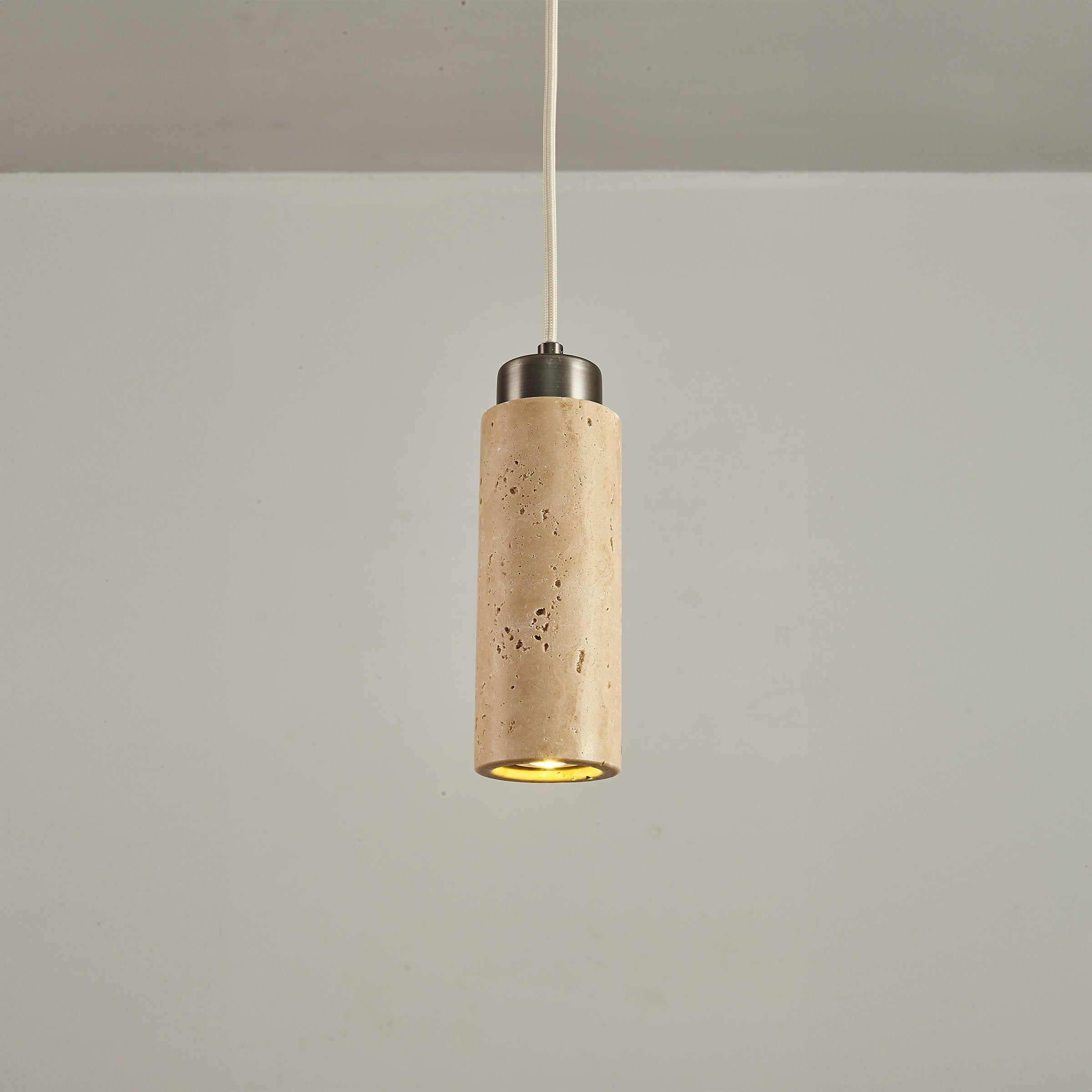 Beige travertine pendant lamp by BEACON/JIADG, modern ceiling light with stone-textured shade for stylish interior lighting.