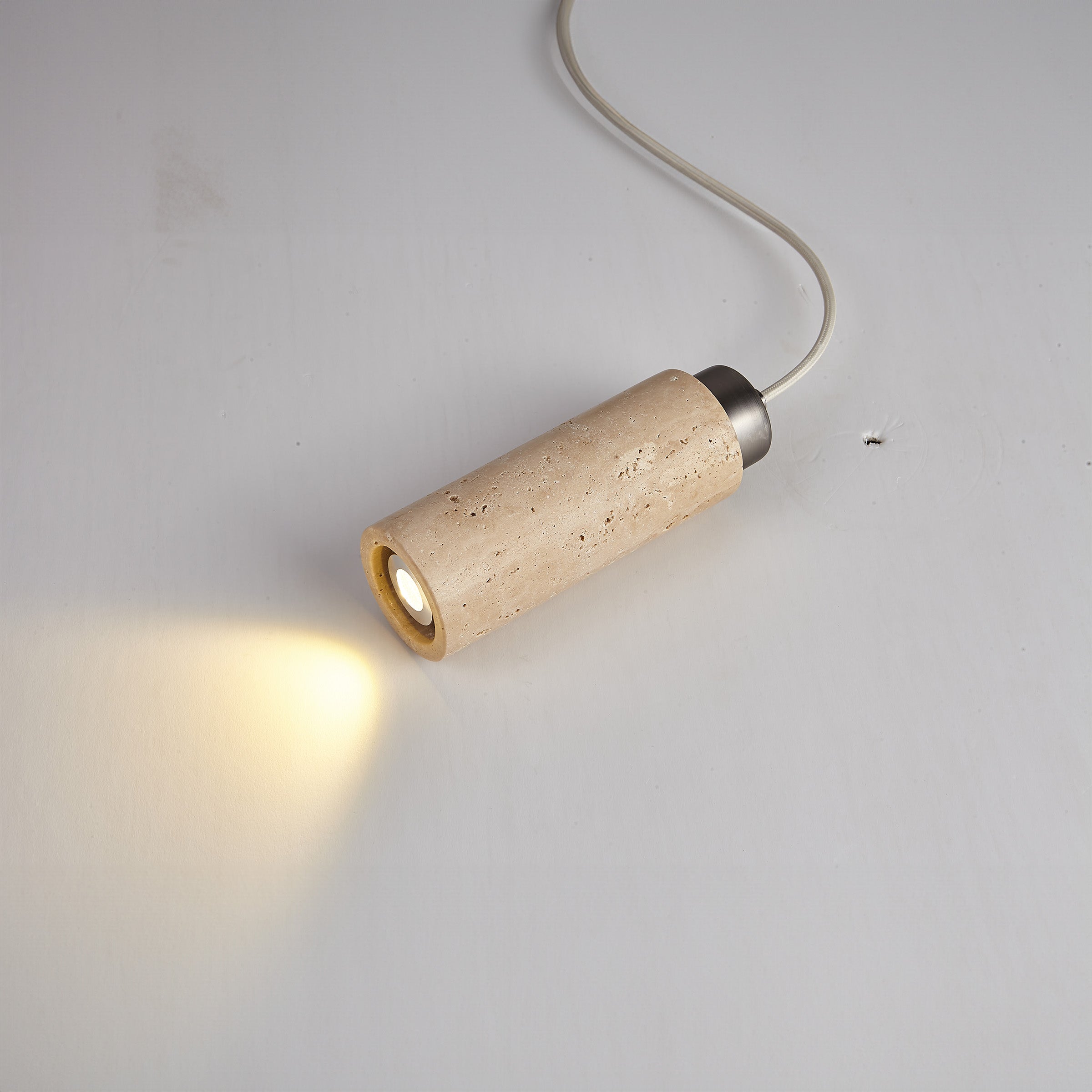 BEACON travertine pendant lamp 60005-1P hangs with a natural stone finish, modern pendant lighting for stylish interiors.