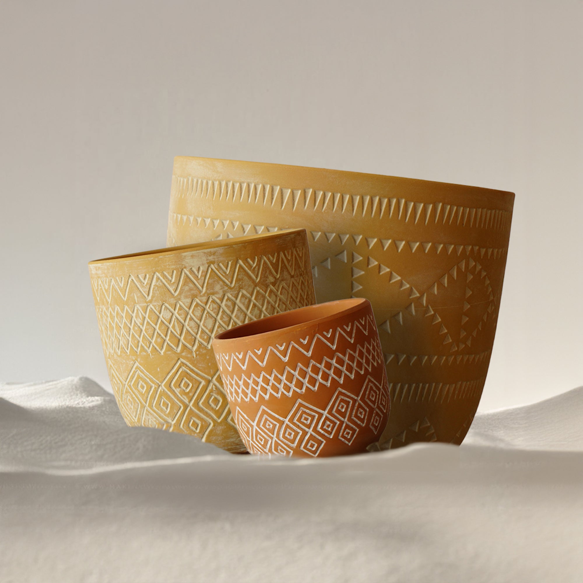 Triangular terracotta planter box by BEACON indoors or outdoors, featuring a modern geometric design and durable ceramic finish.