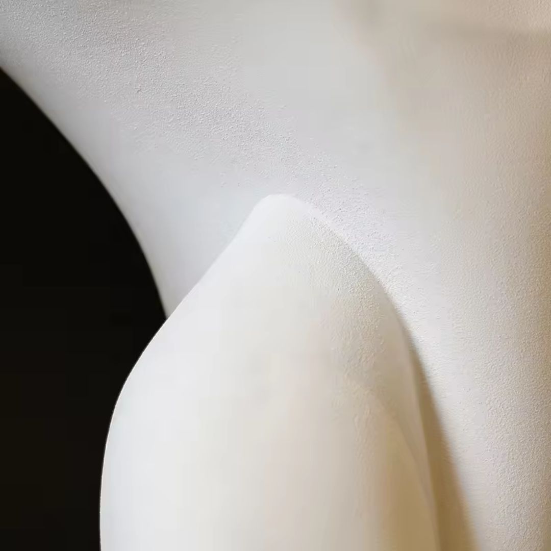 White resin abstract sculpture titled "Turn Life Around" by BEACON, used as a stylish home decor figurine.