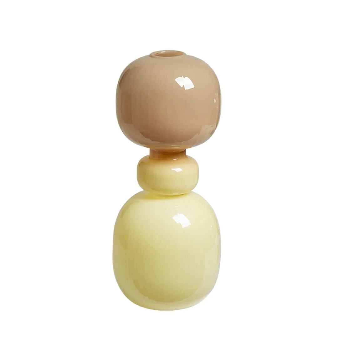 Two-color ceramic vase with a white bottom and colorful top, designed by BEACON, ideal for decorative floral arrangements.