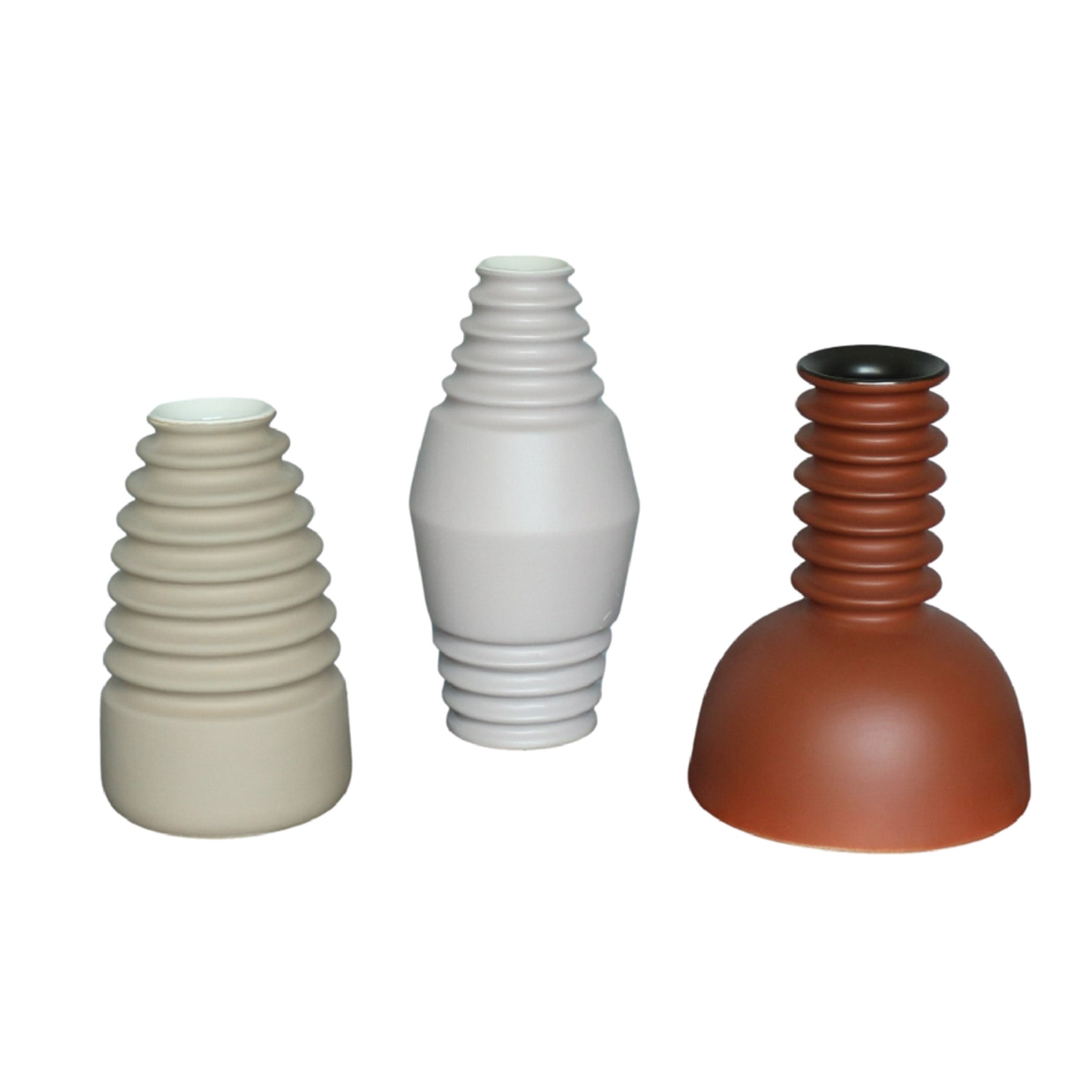 Unique textured brown clay vase by BEACON, showcasing a rustic design with intricate surface details.