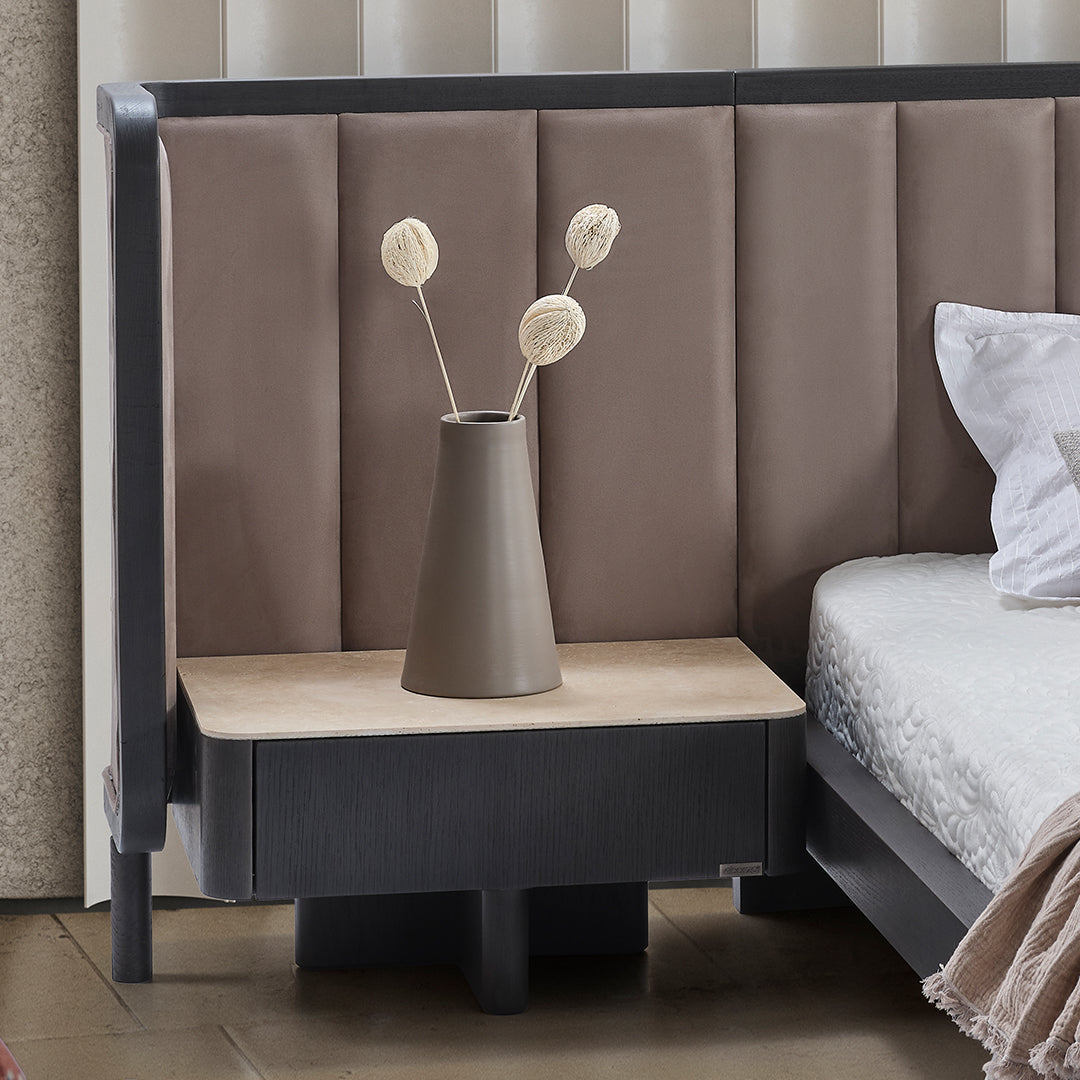ECOLE LIVING UTOPIA bedside table with a sleek wooden finish and modern design, featuring a drawer and open shelf for bedroom storage.