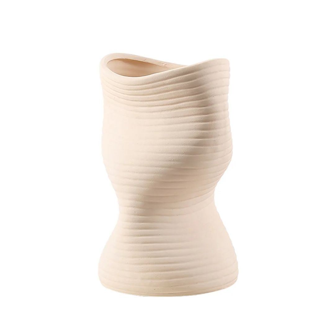 Beige vertical curved vase from BEACON, made of ceramic, with a sleek, modern design perfect for contemporary decor.