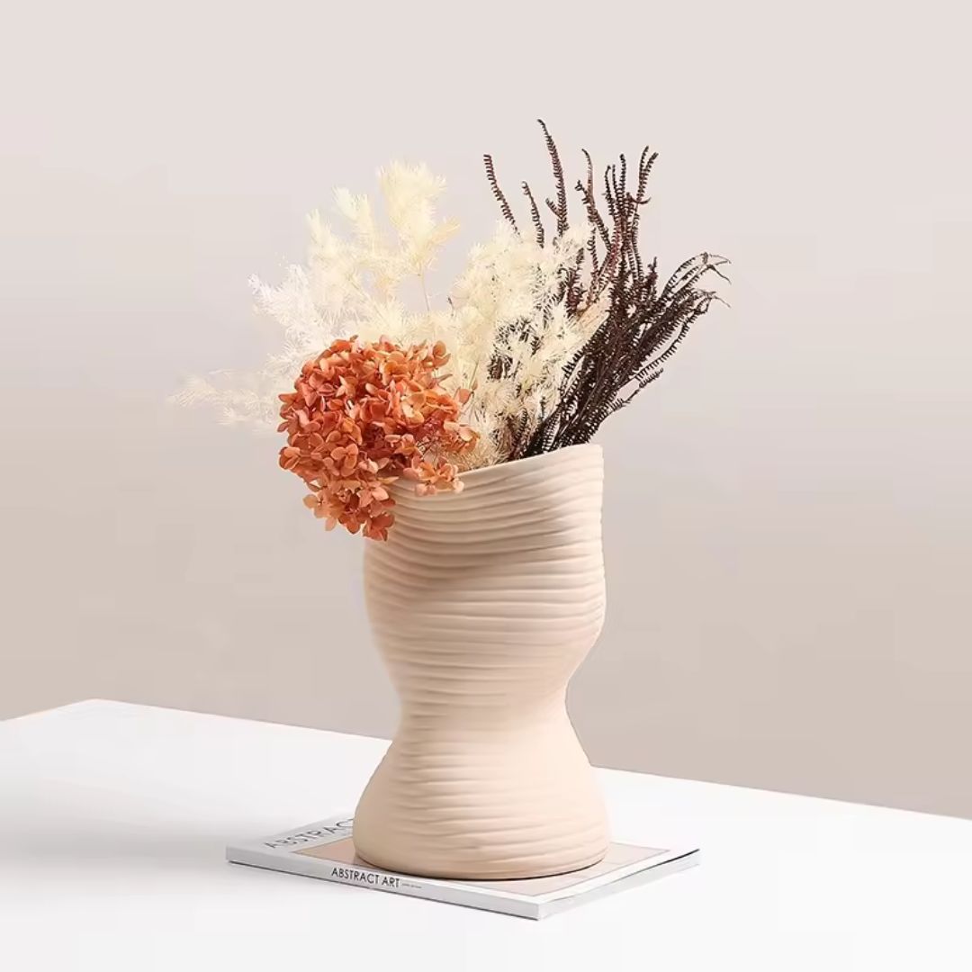 Beige BEACON vertical curved vase FD-D22115B with a sleek, modern design, suitable for floral arrangements or decorative display.