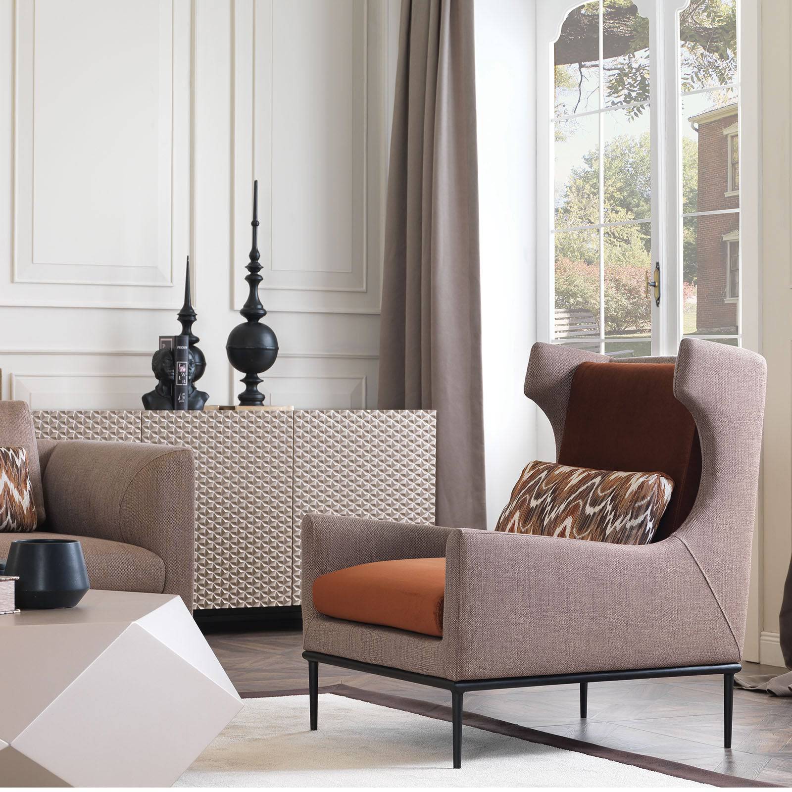 YOL LIVING Vittoria Lounge Chair and Valeria Armchair with plush upholstery and modern design, placed in a stylish living room setting.