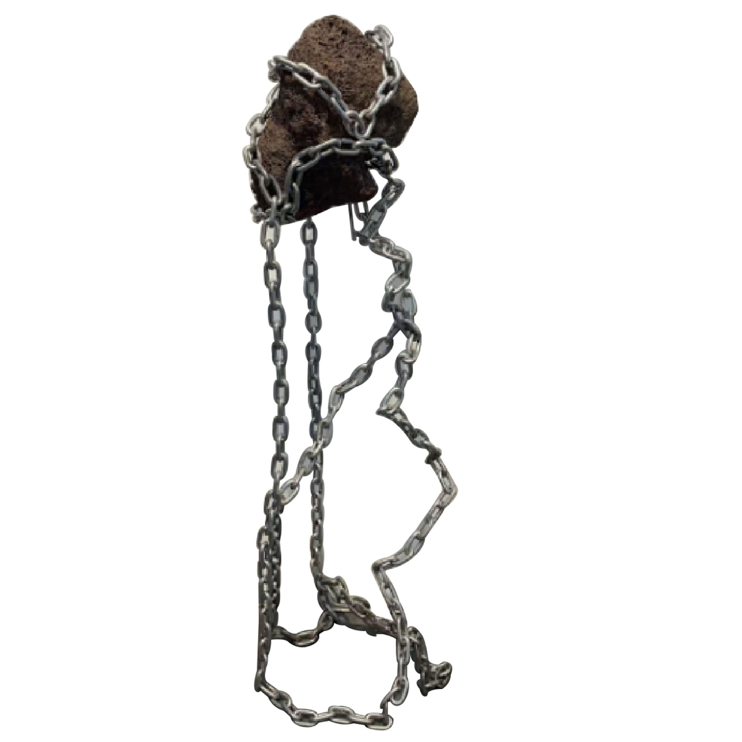 Volcanic stone and stainless steel sculpture from BEACON home decor figurines collection, showcasing modern artistic design.