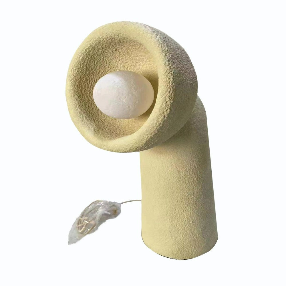 Wabi Sabi beige desk lamp by BEACON with a modern, minimalist design, featuring a cylindrical base and a soft, warm glow.