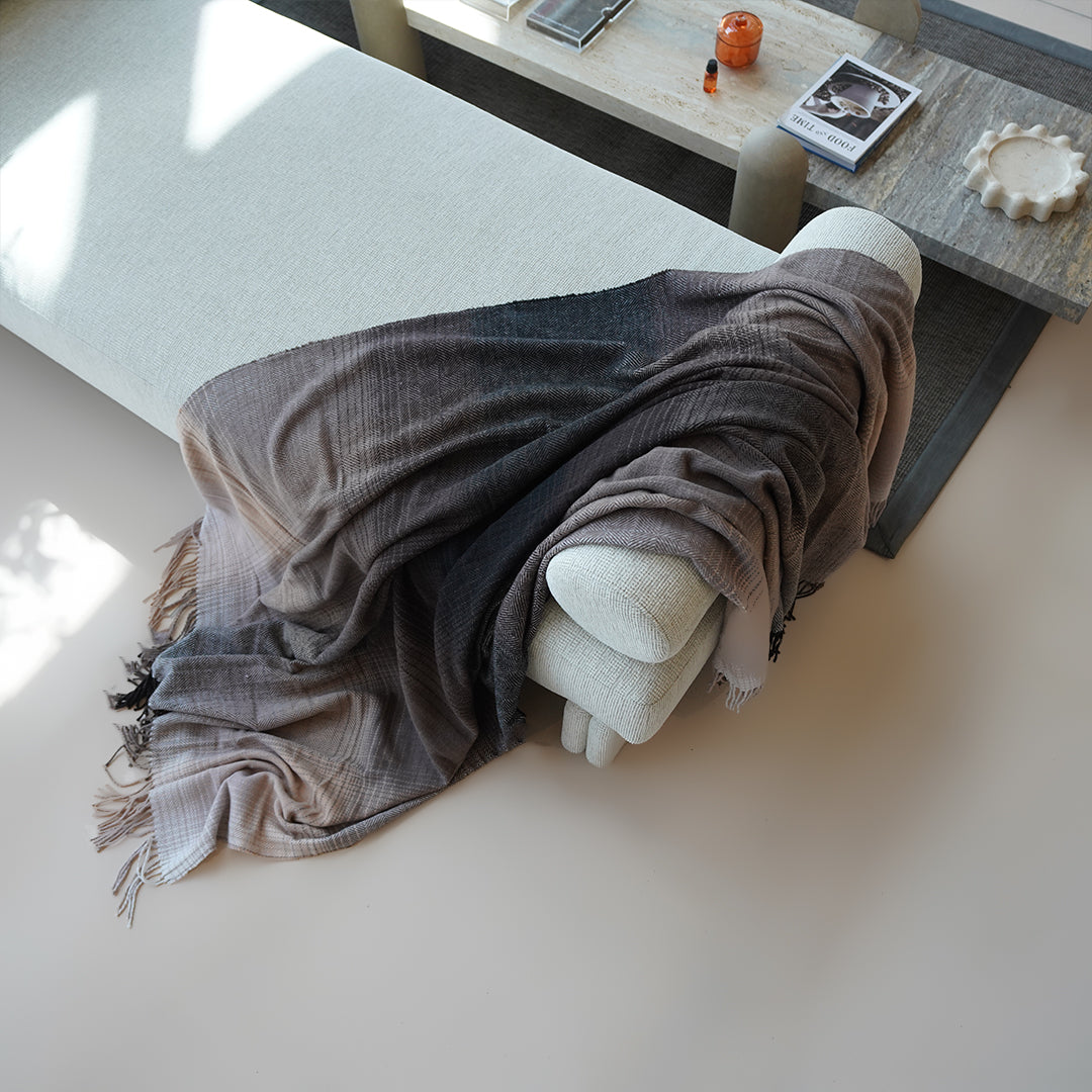 BEACON WarmNest throw blanket in 300GSM, soft and cozy textile, shown folded with plush fabric visible.